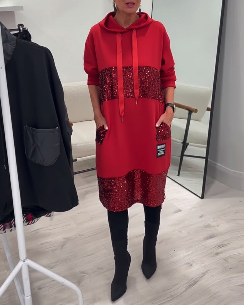 Witamy w modnej sukience z dekoltem i patchworkiem 